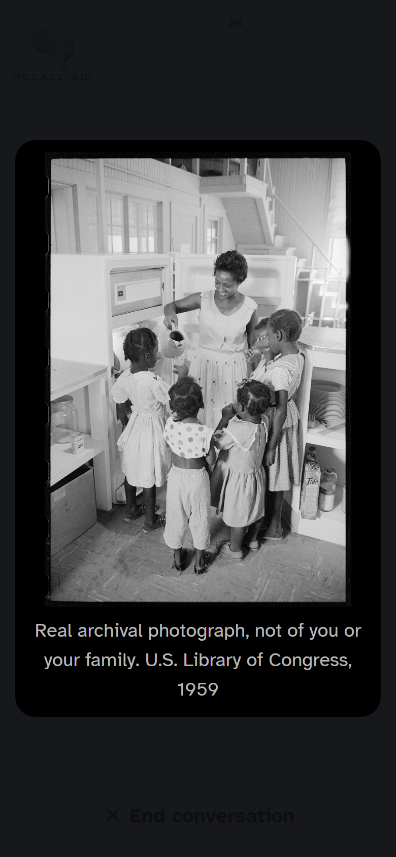 Sample screen: during the voice call, they ask for a photo and the app shows an archival photo with a clear disclosure that it is not their family photo.